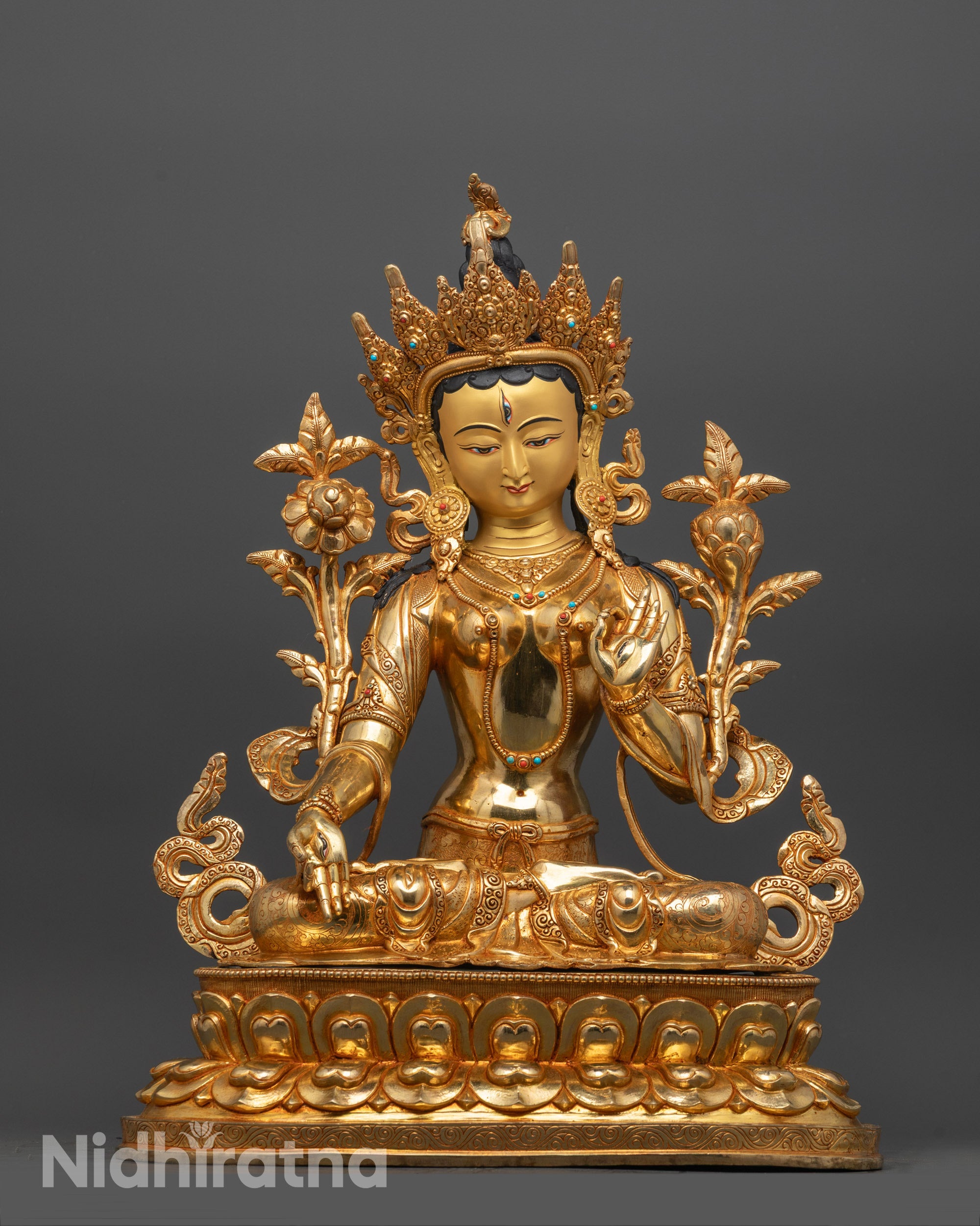 Front view of Exquisite White Tara Statue with gold-gilded face and lotus seat detail