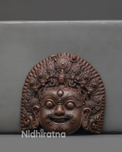 Front view of Fierce Bhairav Mask showing oxidized copper details and fierce expression