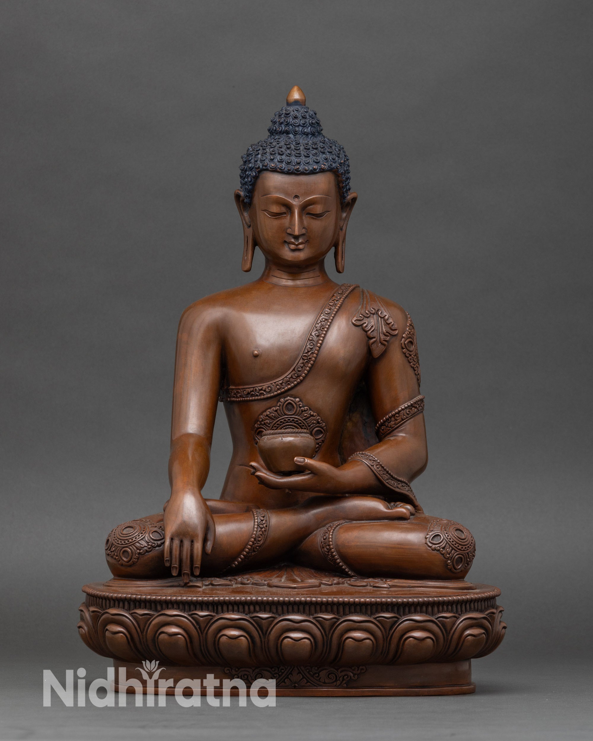 Front view of Gautama Buddha statue, handcrafted Nepalese copper altar sculpture