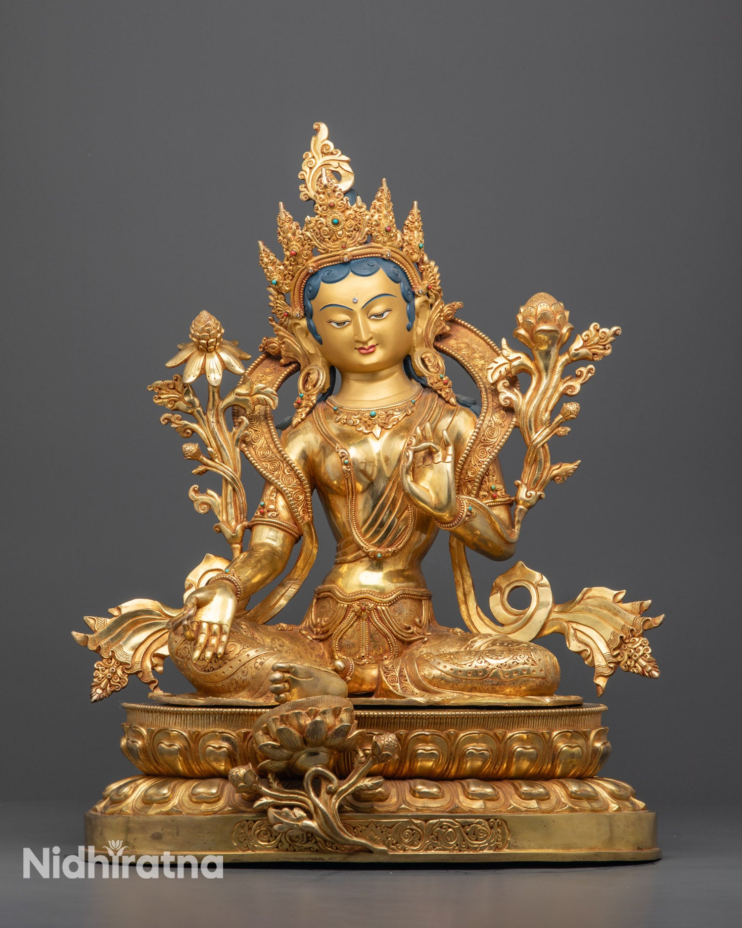 Front view of Goddess Green Tara Statue with gold gilding and semi-precious stones

