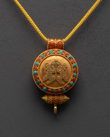 Front view of Golden Fish Ghau Pendant with gold gilding and semi-precious stones