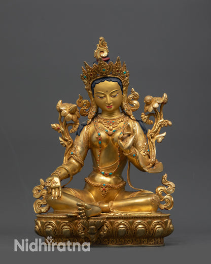 Front view of Green Tara Sculpture with lotus seat and gold-gilded face from Nepal
