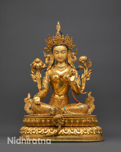 Front view of Green Tara Statue on double-layered lotus seat holding utpala flower in hand