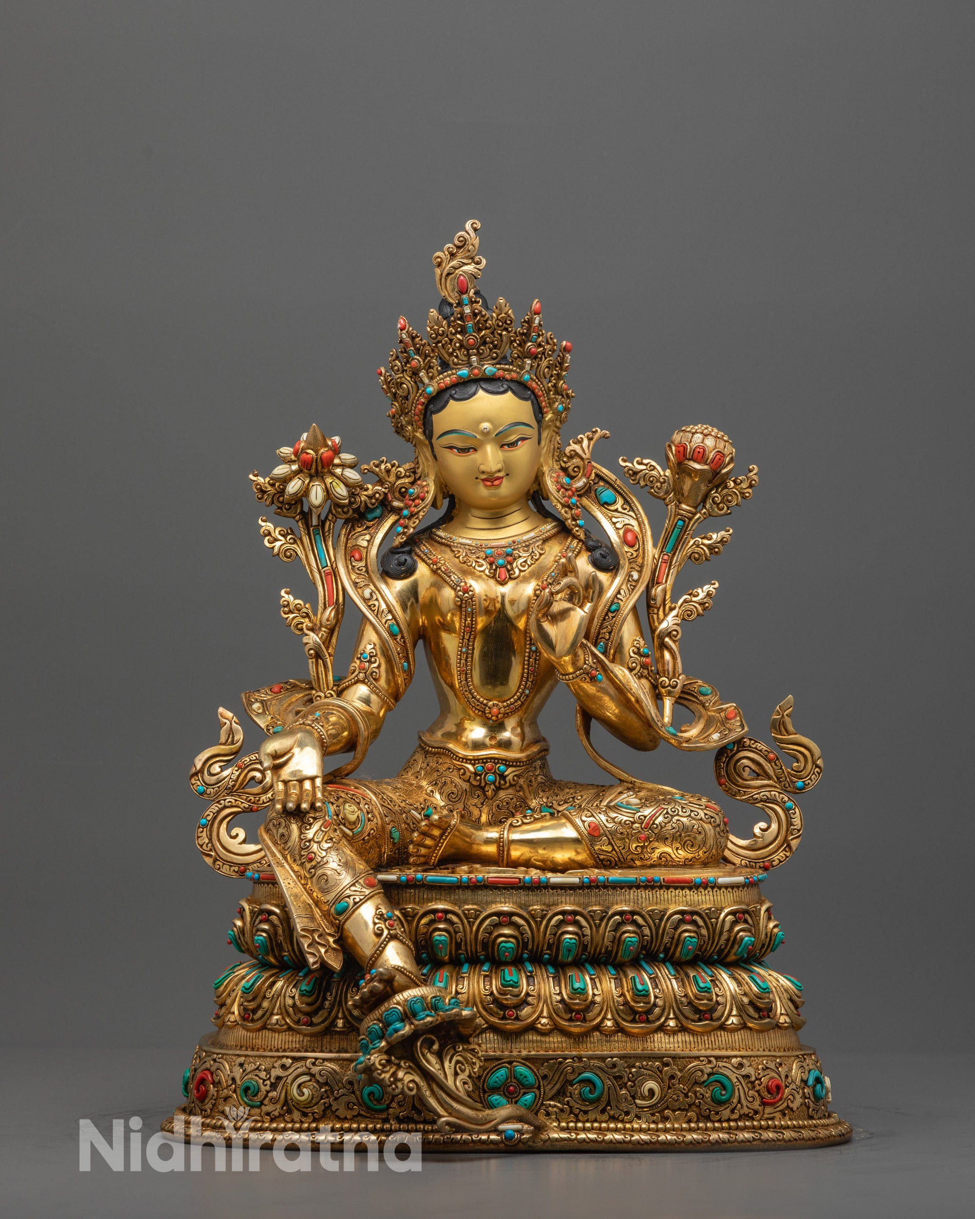 Front view of Green Tara Statue with gold-gilded face and fire-gilded body on copper base