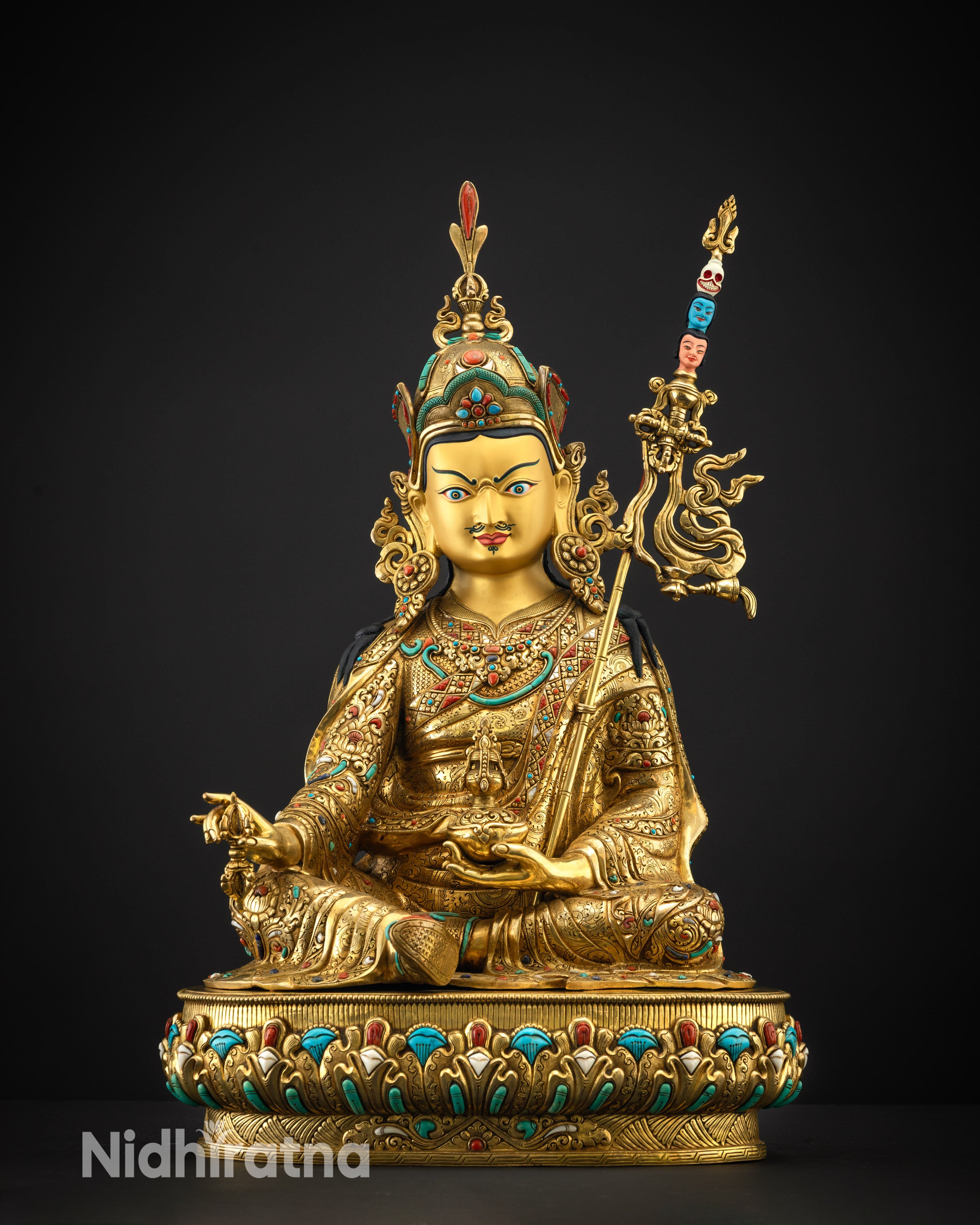 Front view of Guru Padmasambhava statue with lotus hat and gold-gilded finish
