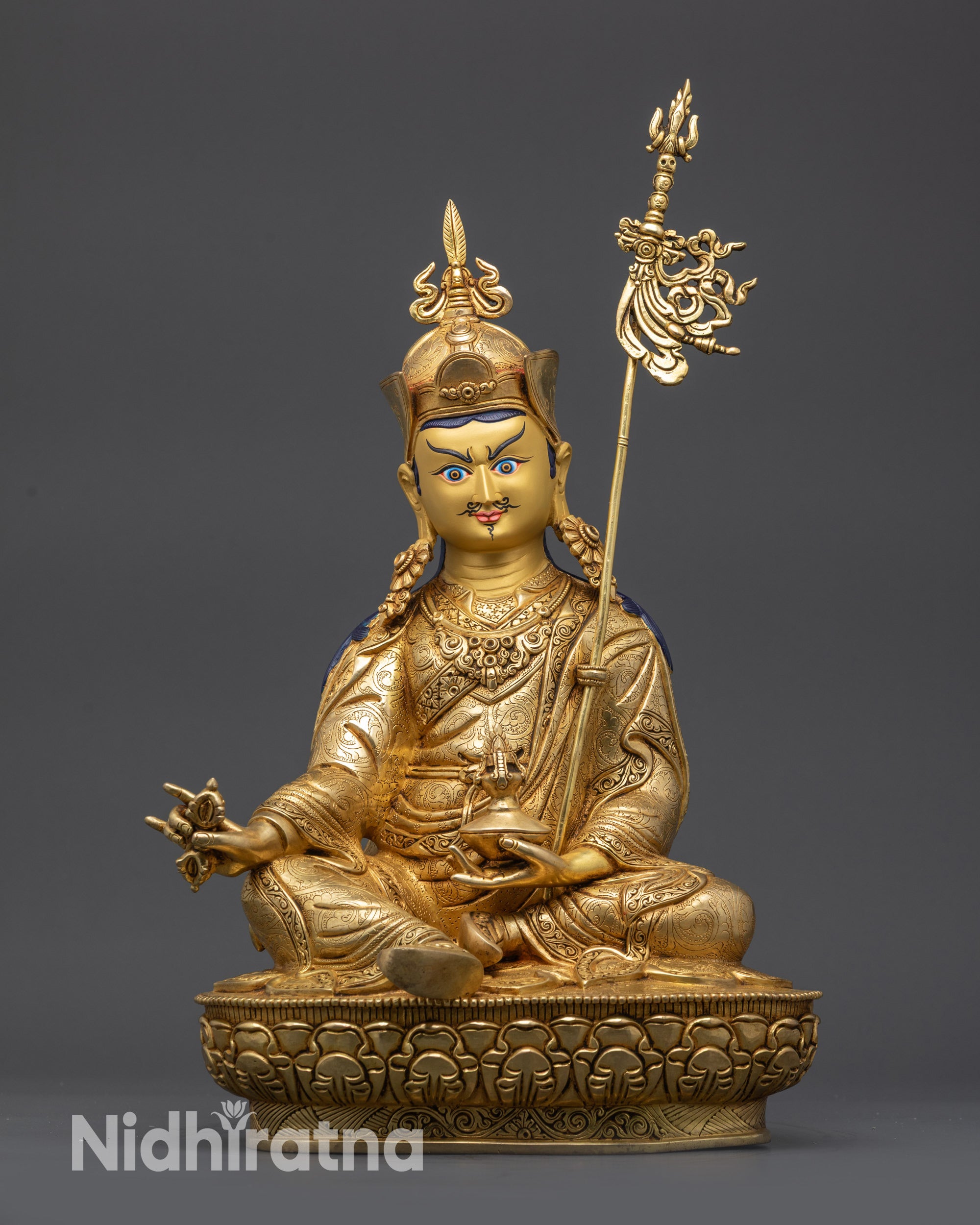 Front view of Guru Rinpoche Statue gold-gilded Himalayan Buddhist artwork