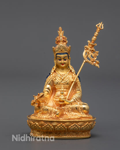 Front view of Guru Rinpoche Statue machine-made in Nepal with 24k gold-plated