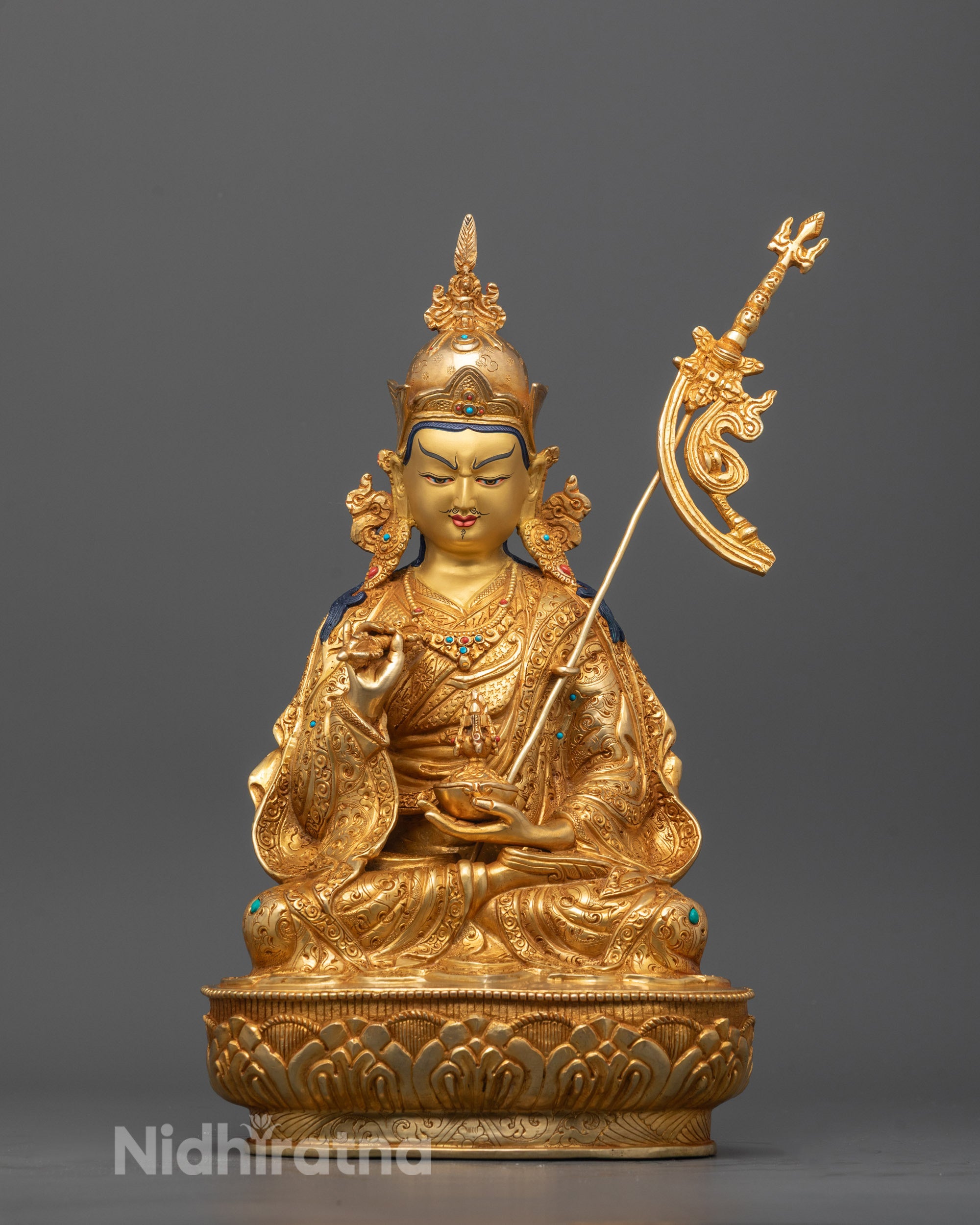 Front view of Guru Rinpoche Statue seated in lotus posture with detailed ornaments