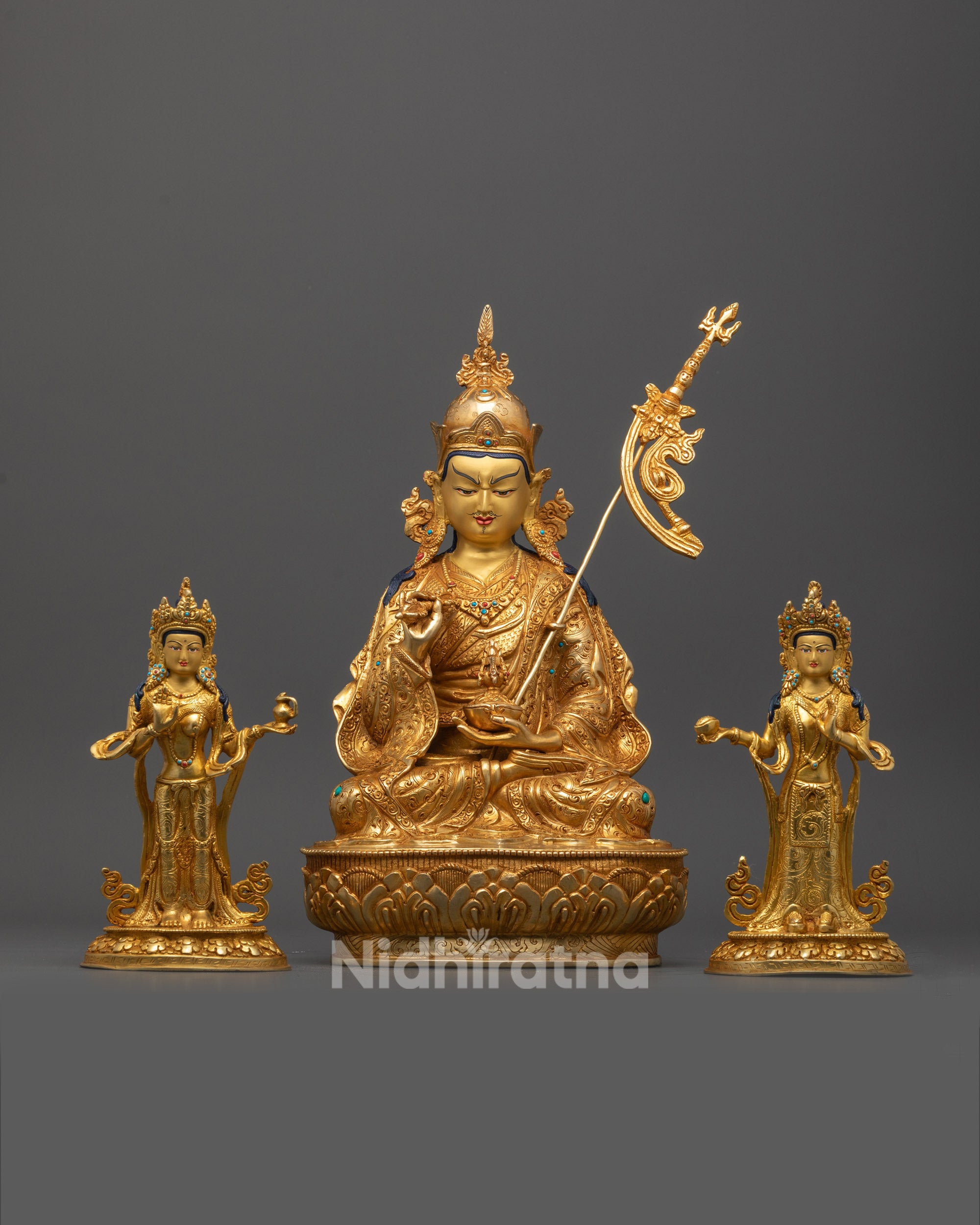 Front view of Guru Rinpoche Statue with Two Consorts seated in detailed lotus posture