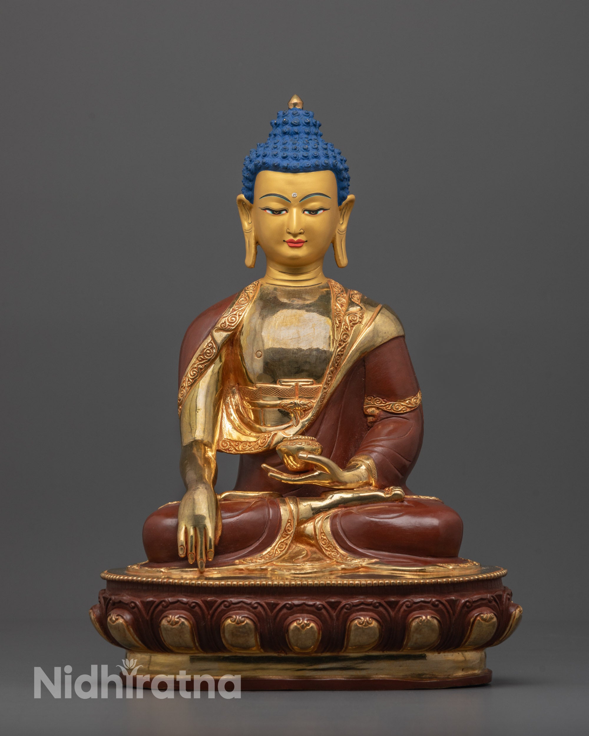 Front view of Half-Gold Shakyamuni Buddha Statue seated on lotus base in meditative posture