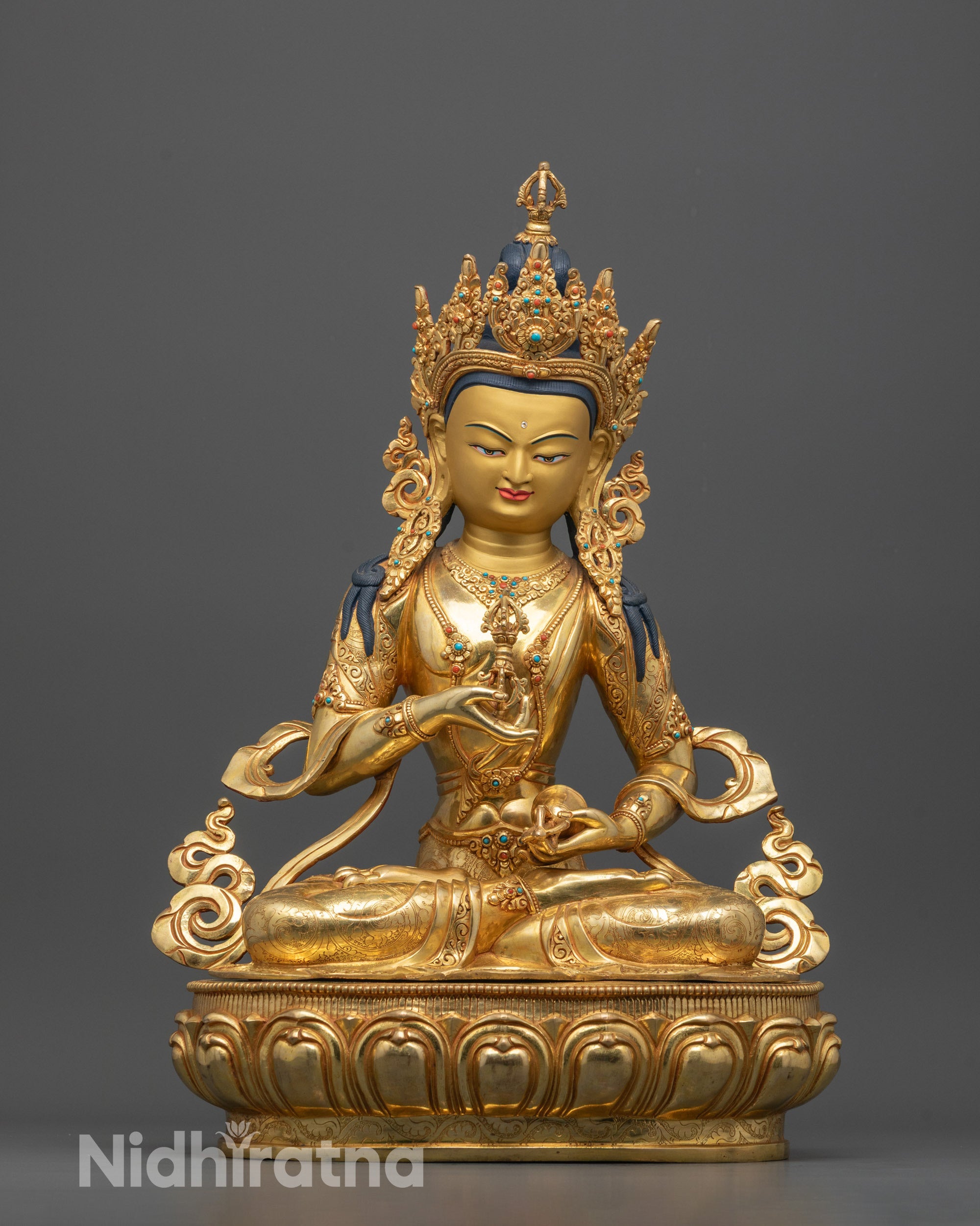 Front view of Hand-Forged Vajrasattva Statue with gold-gilded face and lotus seat detail

