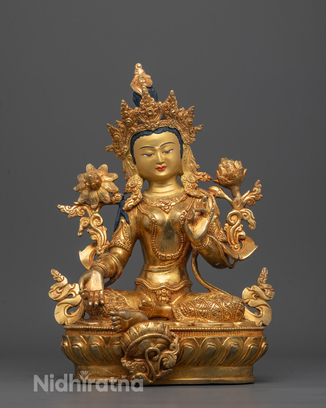 Front view of Hand-carved Green Tara Statue seated on lotus base