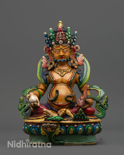 Front view of Hand-painted Dzambhala Statue with orange-hued body on lotus seat