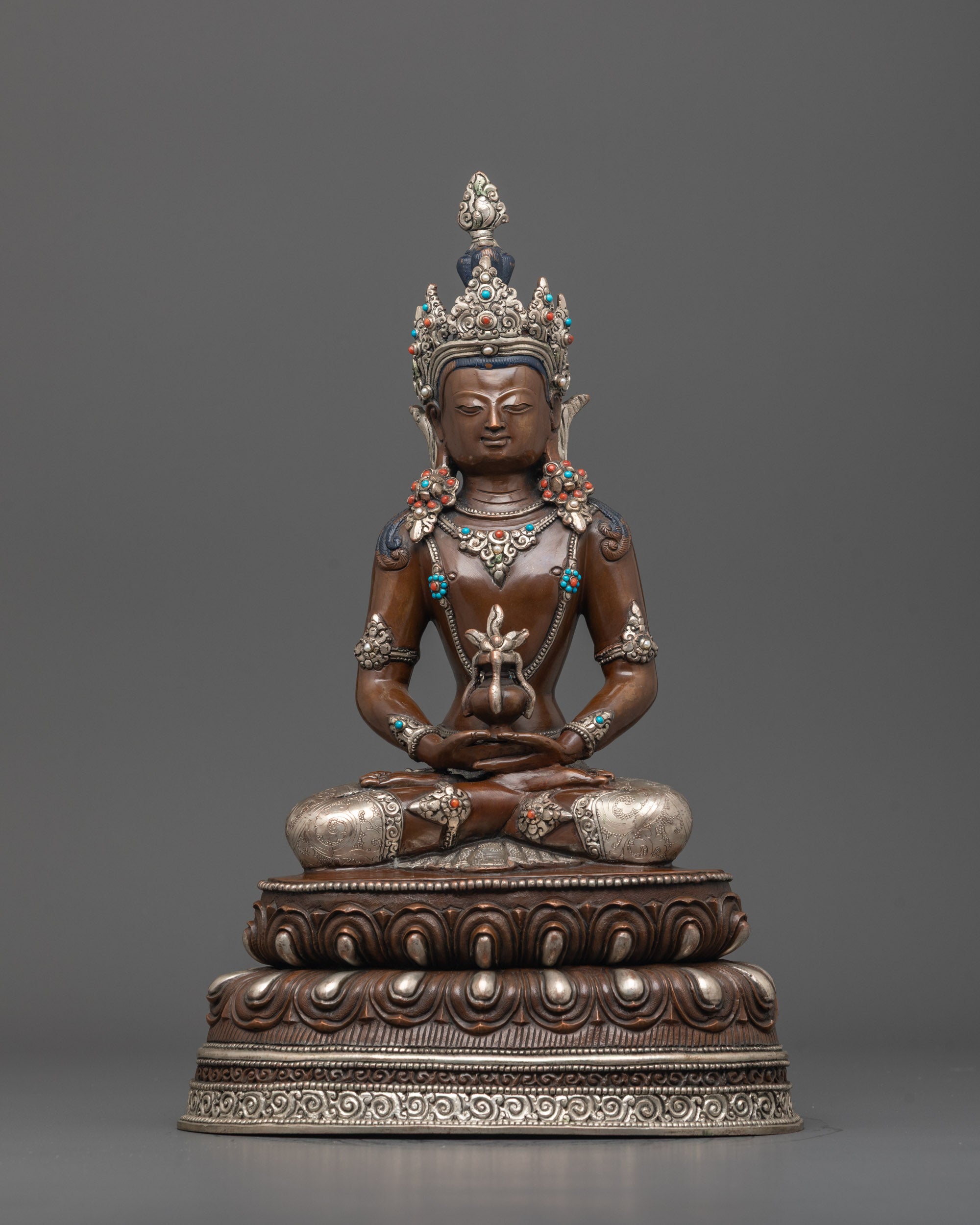 Front view of Handcrafted Amitayus Statue with oxidized copper face and silver finish