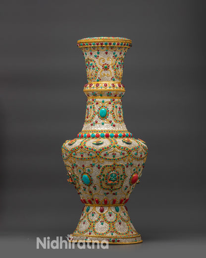 Front view of Himalayan Flower Vase handcrafted in Nepal, featuring silver and gold-plated filigree design with semi-precious stones and Buddhist deities.