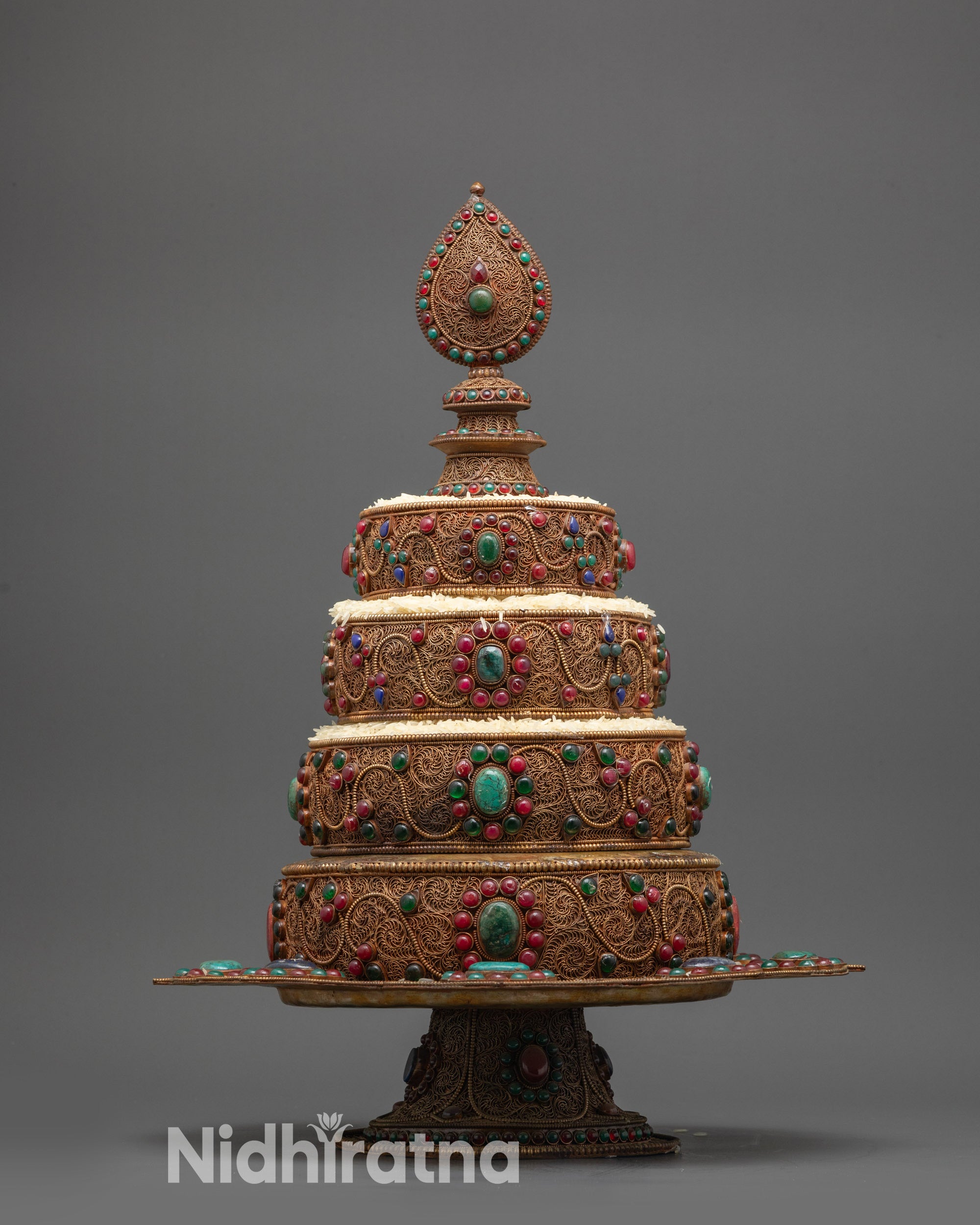 Front view of Intricate Tibetan Mandala Set with copper filigree and semi-precious stones