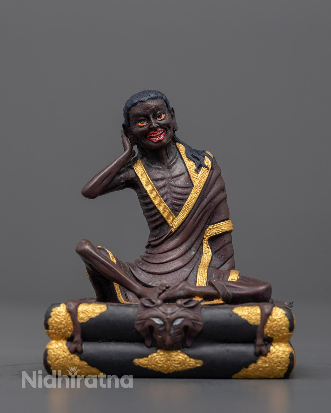 Front view of Machine-Made Milarepa statue with gold plating and intricate carvings