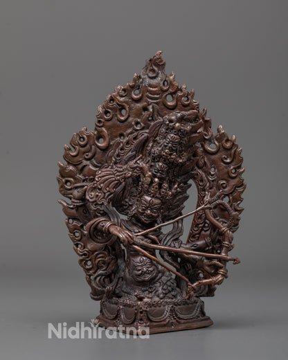 Front view of Machine-Made Rahula Statue with oxidized finish and wrathful expression
