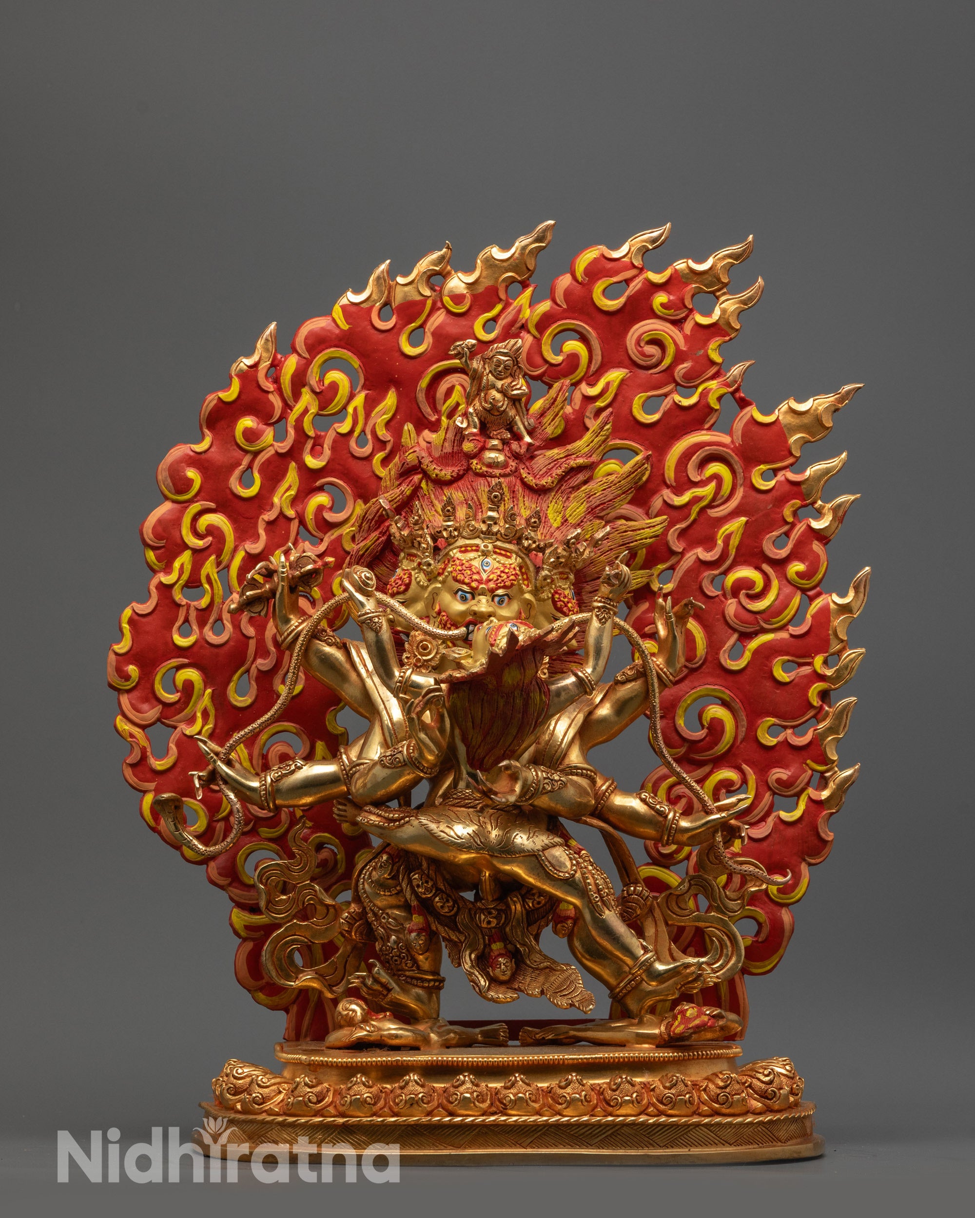 Front view of Mahachakra Vajrapani Consort Statue with gold-gilded face and body on copper base