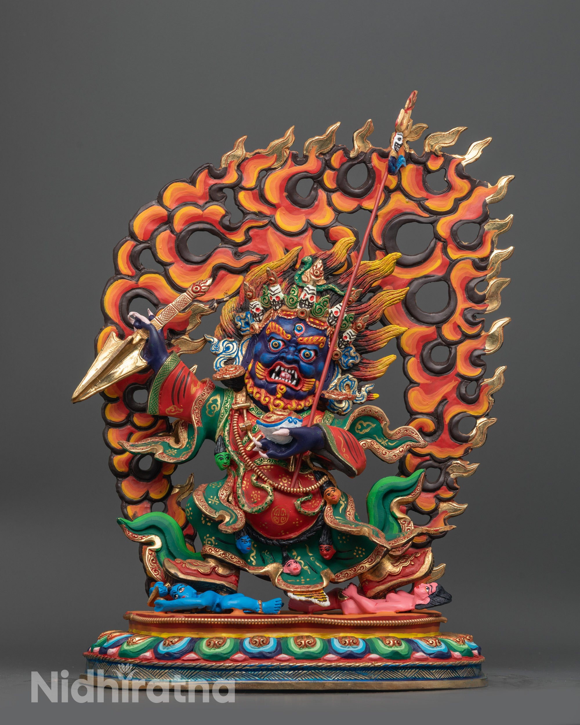 Front view of Mahakala Bernagchen Statue with blue body and gold-plated details