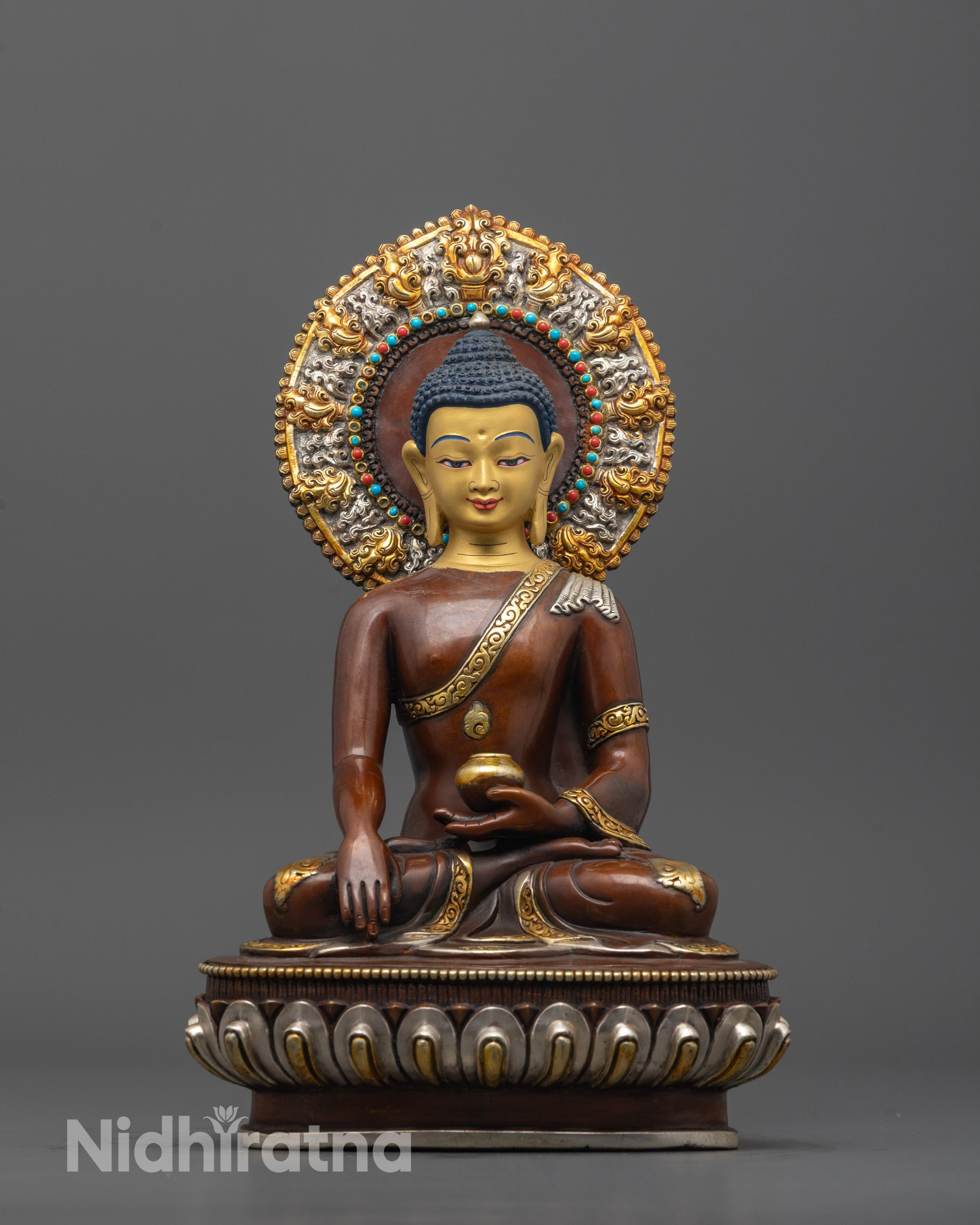 Front view of Majestic Buddha Shakyamuni Sculpture with 24K gold-gilded face and earth-touching mudra
