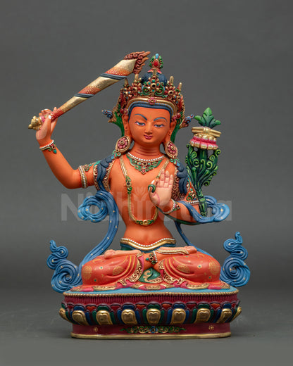 Front view of Manjushri Buddhist statue holding flaming sword and Prajnaparamita Sutra