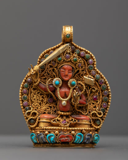 Front view of Manjushri Locket featuring radiant red crystal and gold-gilded filigree, crafted by master artisans from Patan, Nepal.