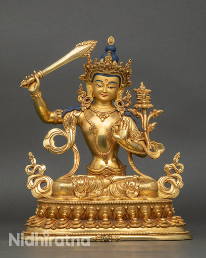 Front view of Manjushri Statue, copper and gold-gilded Bodhisattva of Wisdom