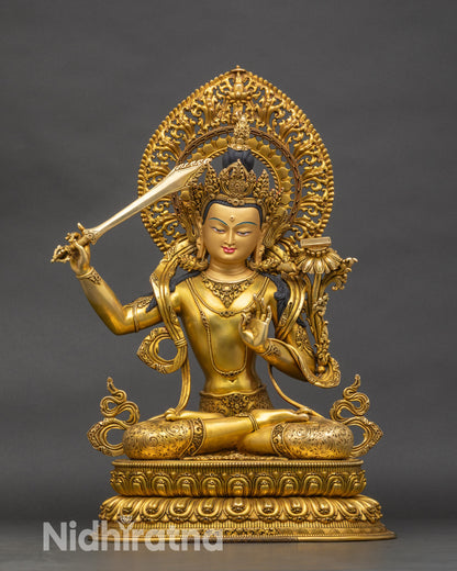 Front view of Manjushri statue, gold-gilded copper Bodhisattva of Wisdom