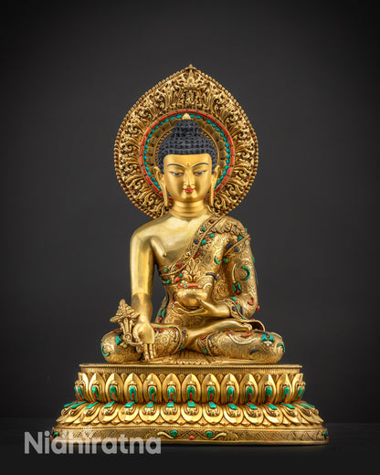 Front view of Masterpiece Medicine Buddha Statue with serene gold-gilded calm facial expression