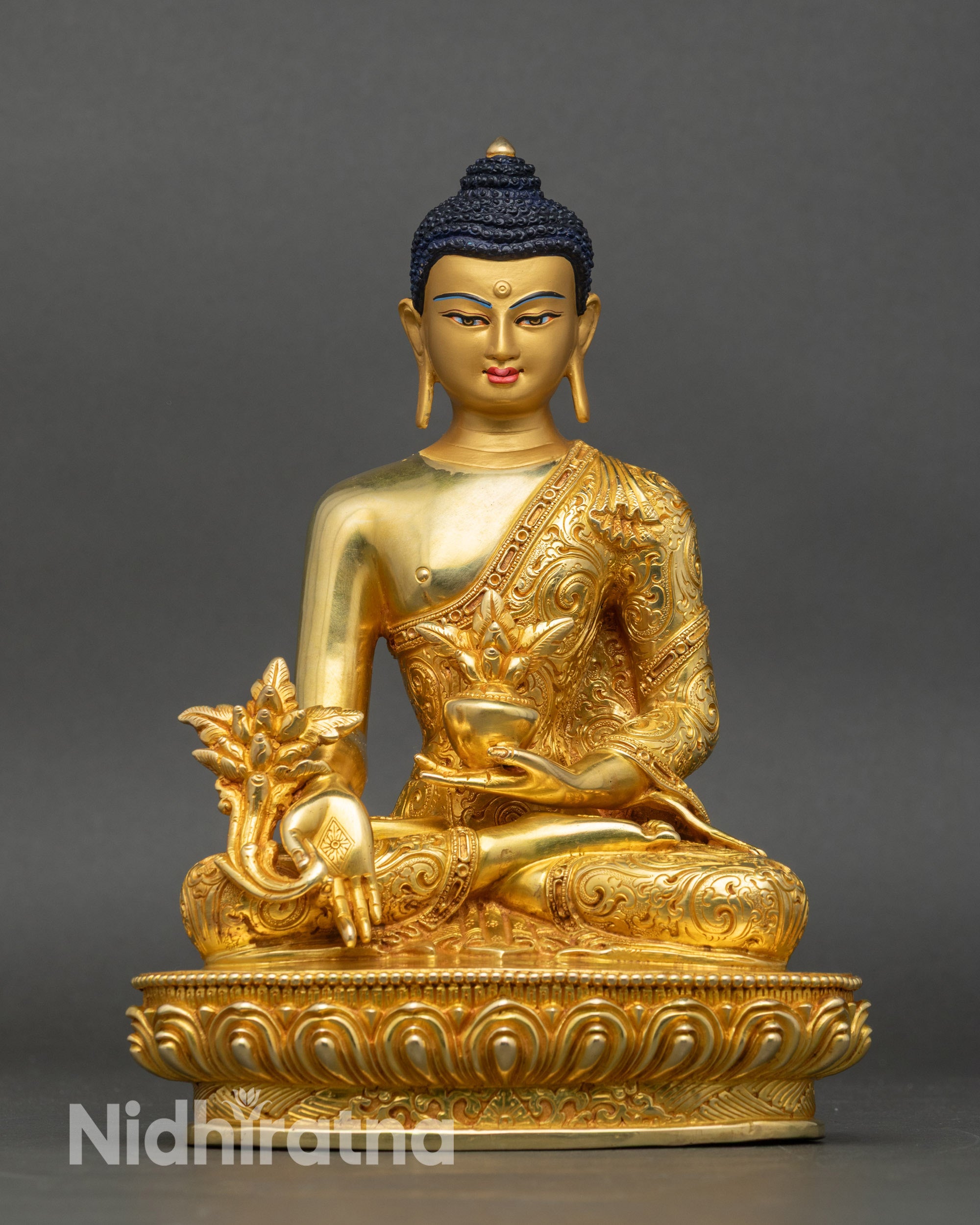 Front view of Medicine Buddha statue, handcrafted copper with gold fire-gilding