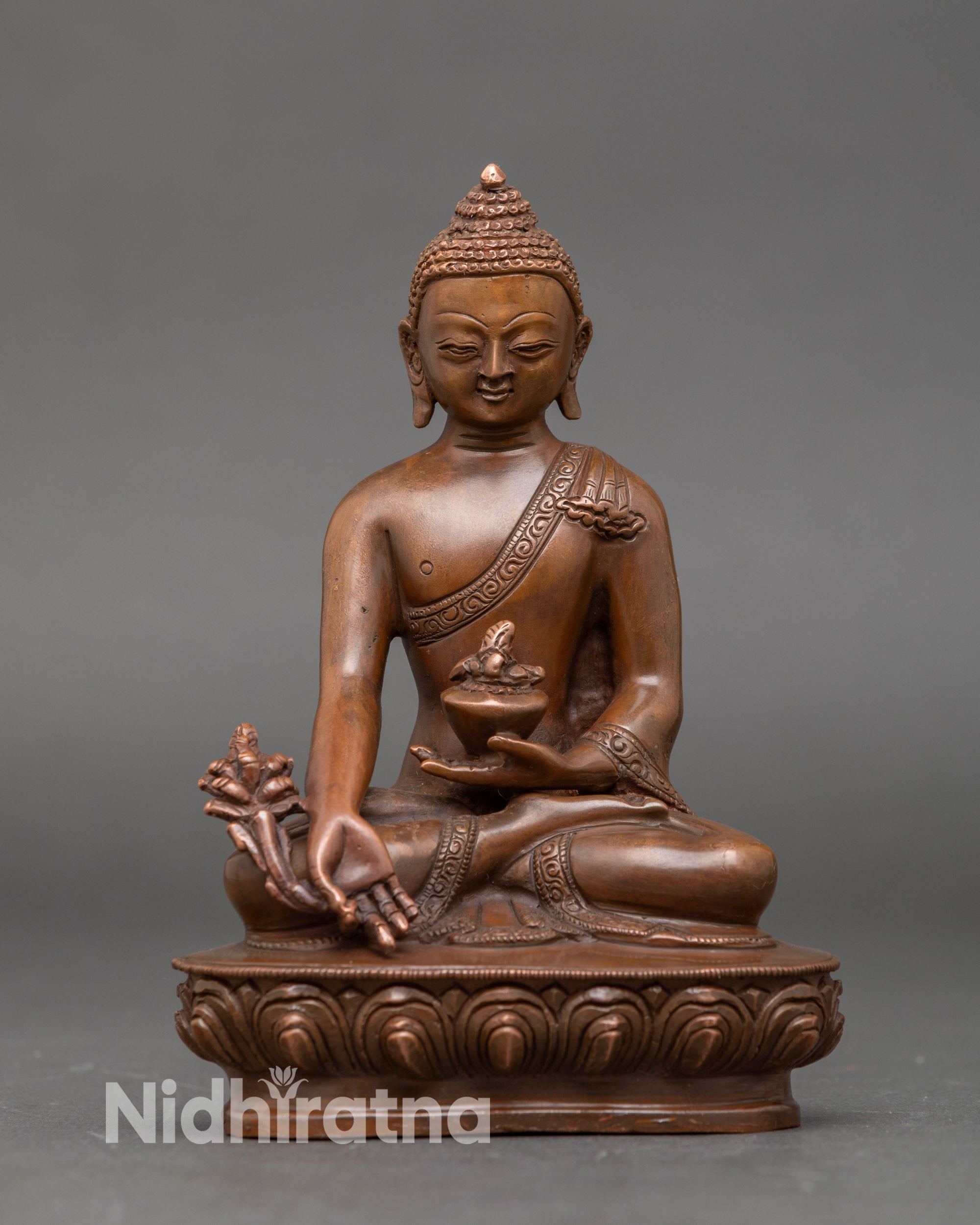 Front view of Medicine Buddha statue, handcrafted Nepalese copper and gold for healing