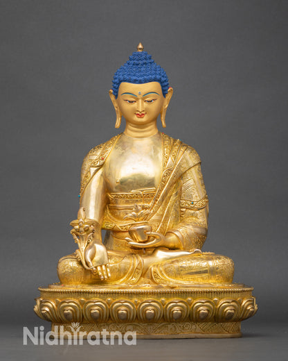 Front view of Medicine Buddha statue, handcrafted copper with gold fire-gilding