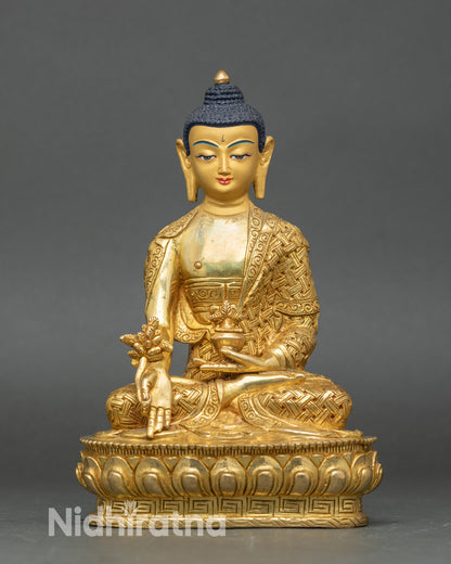 Front view of Medicine Buddha statue, handcrafted copper with gold fire-gilding