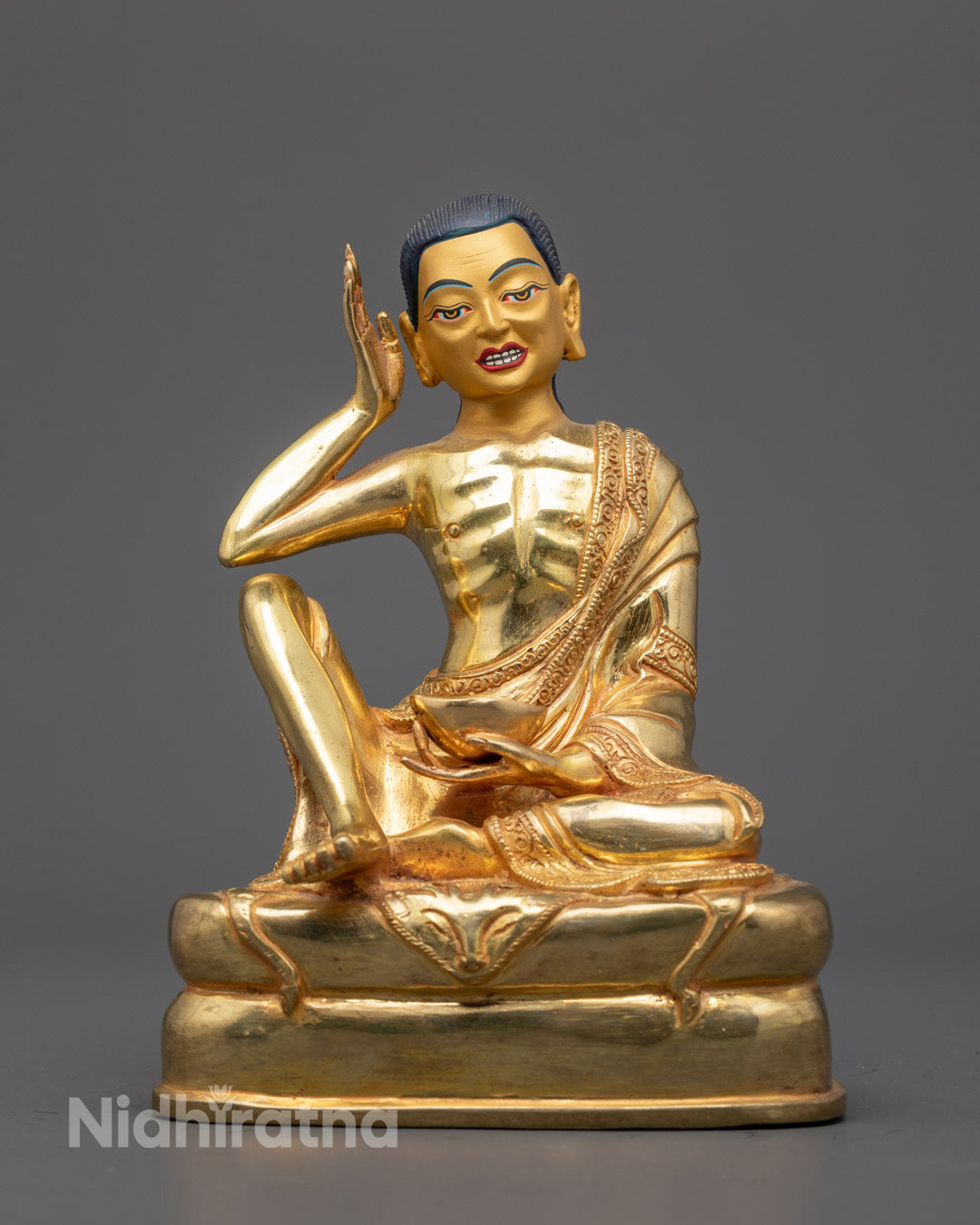 Front view of Milarepa Statue with 24K gold-gilded face and detailed throne