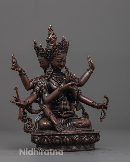 Front view of Namgyalma Sculpture, showcasing oxidized copper finish
