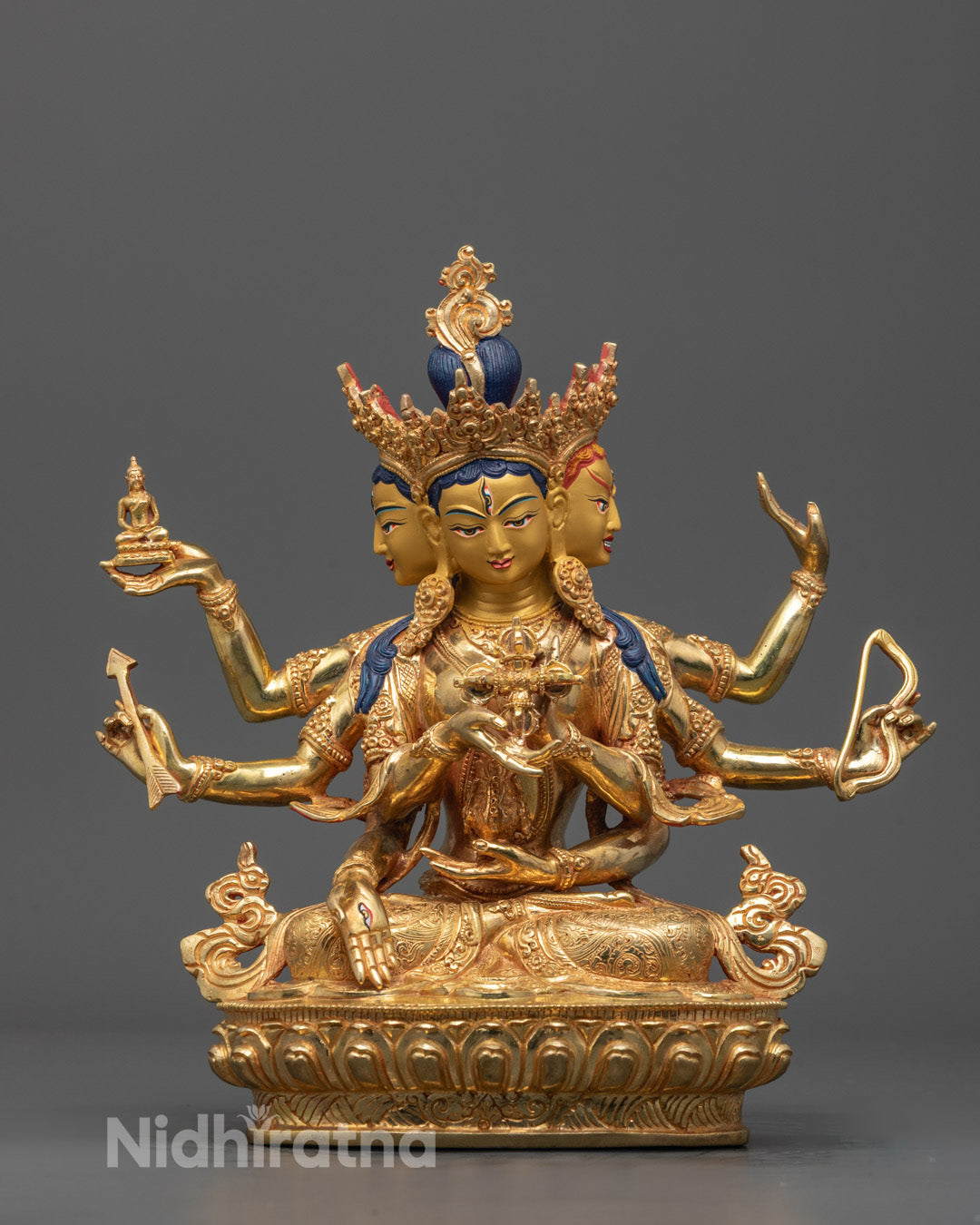 Front view of Namgyalma Statue seated on lotus base with 24k gold gilded face 