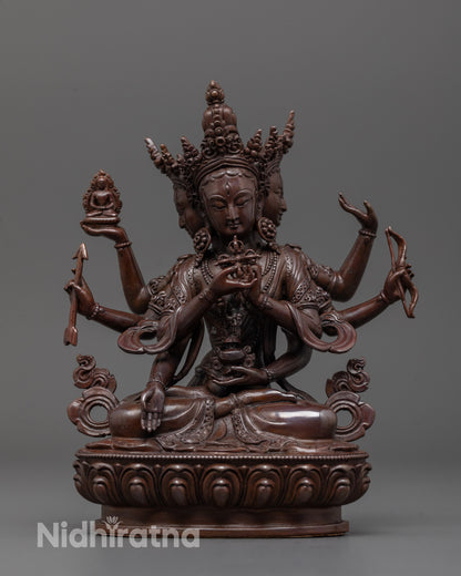 Front view of Namgyalma statue in oxidized copper with lotus base, detailed sacred objects visible
