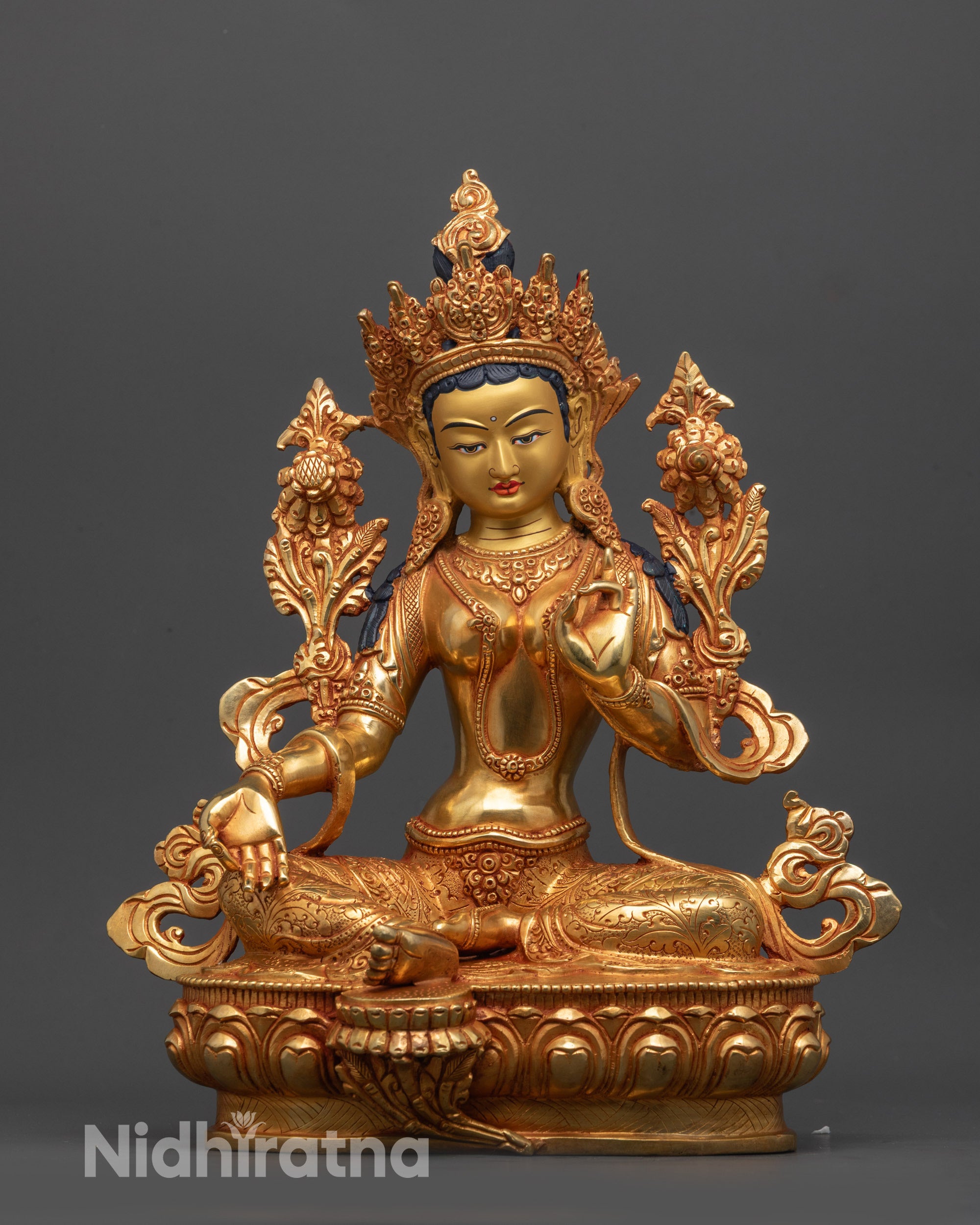 Front view of Nepalese Green Tara Statue with gold face on blooming lotus base