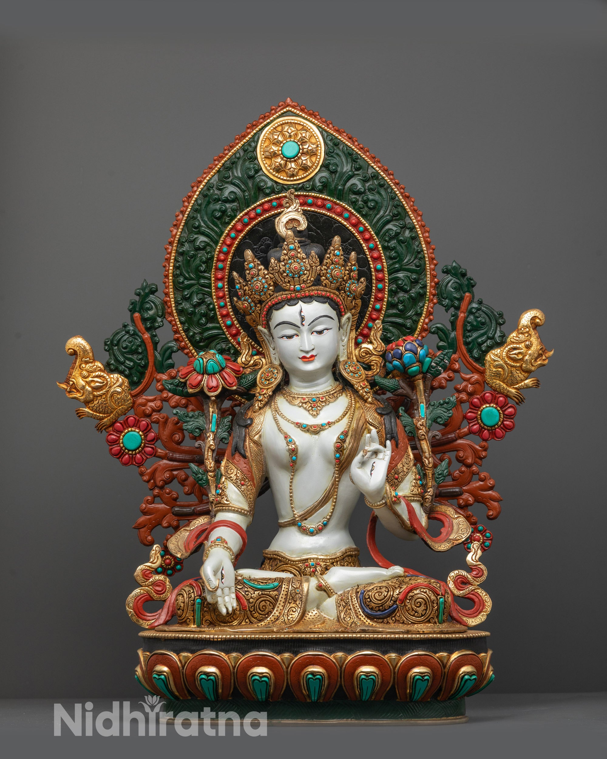 Front view of Nepalese White Tara Statue showing intricate carvings and gold-plated details