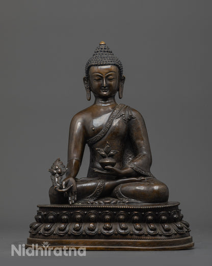 Front view of Oxidized Bhaisajyaguru Buddha Statue with bowl and myrobalan stem