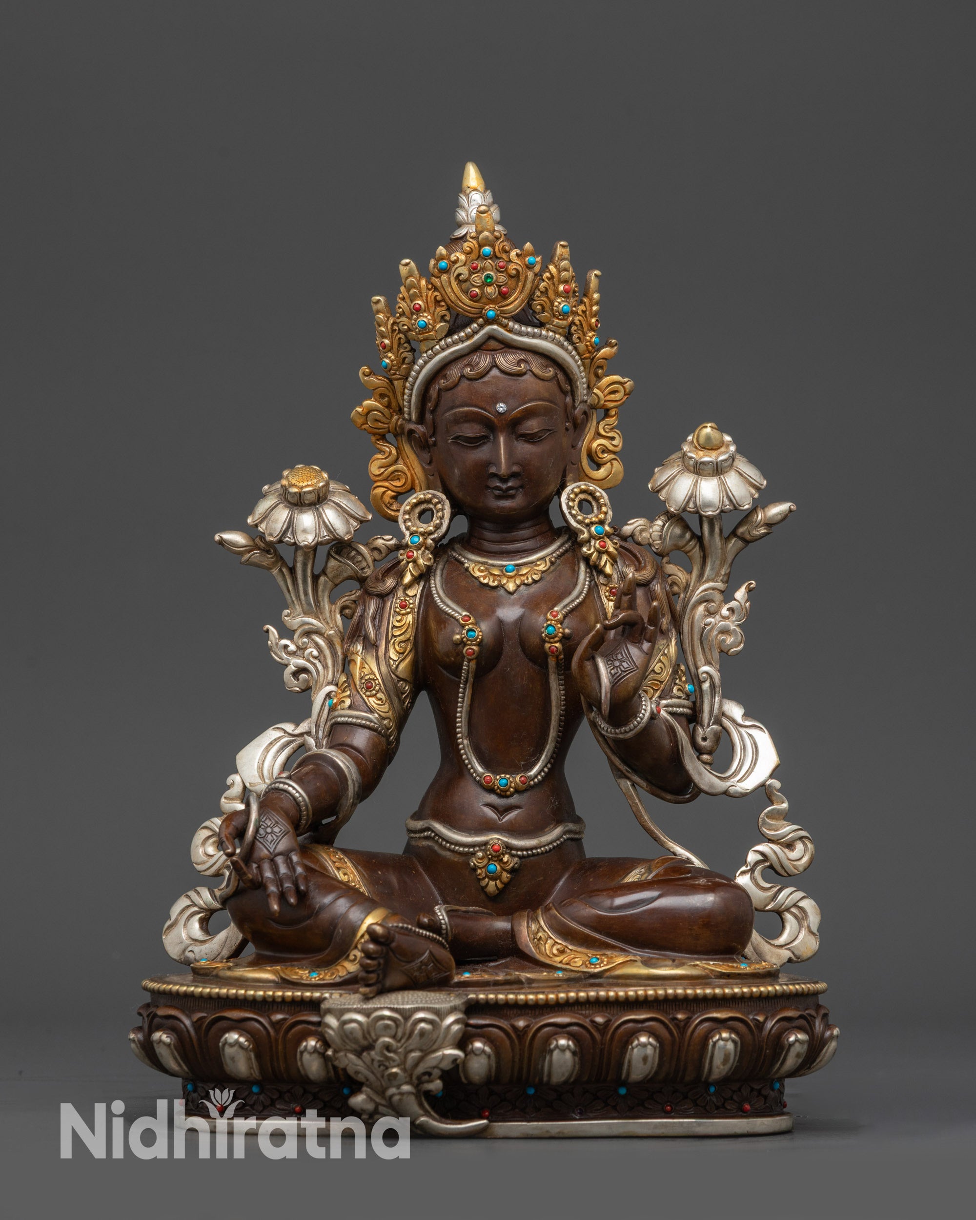 Front view of Oxidized Green Tara Sculpture with crown and lotus pedestal