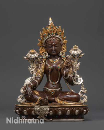 Front view of Oxidized Green Tara Sculpture with crown and lotus pedestal