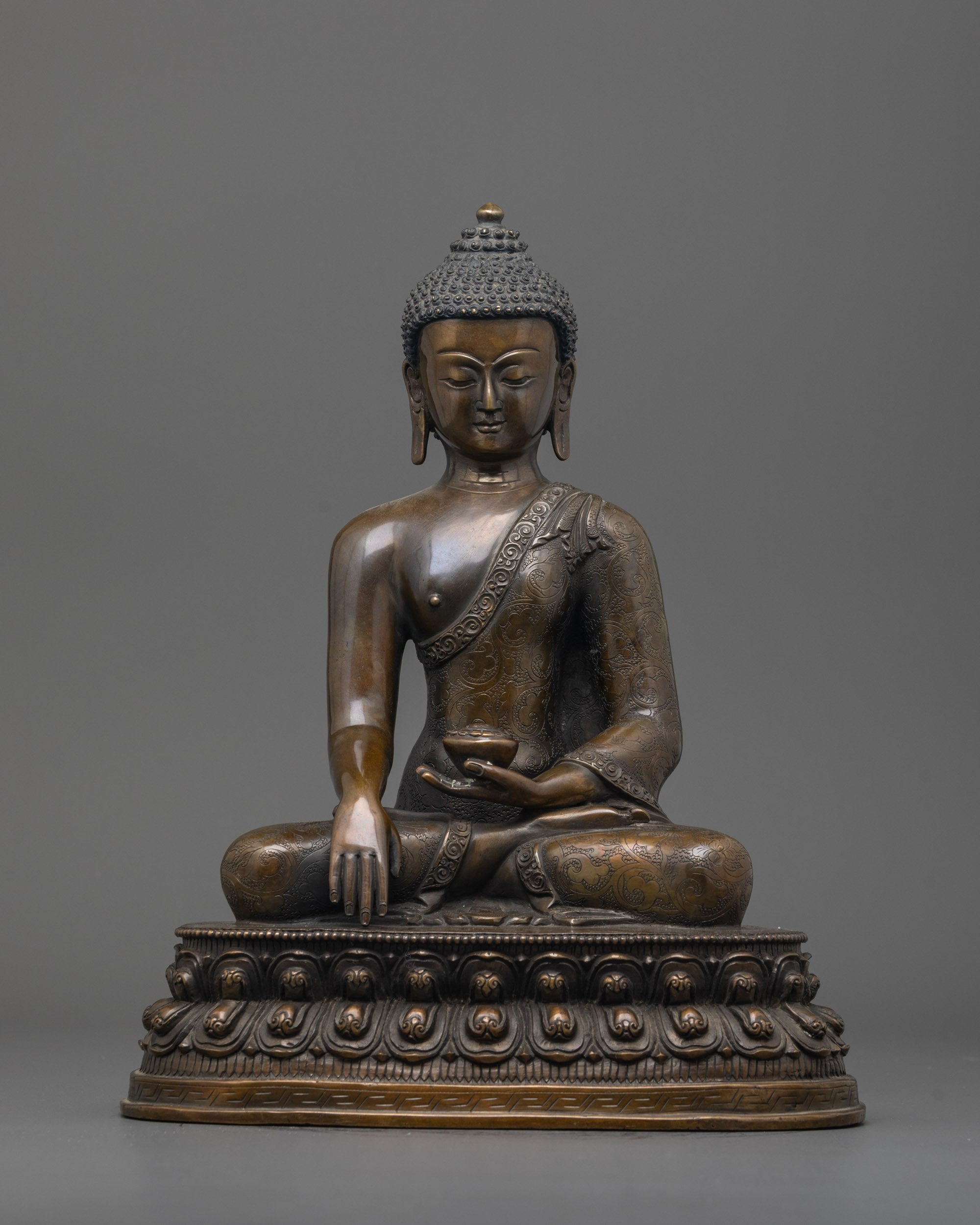 Front view of Oxidized Shakyamuni Buddha Statue showing detailed monk robe and bowl