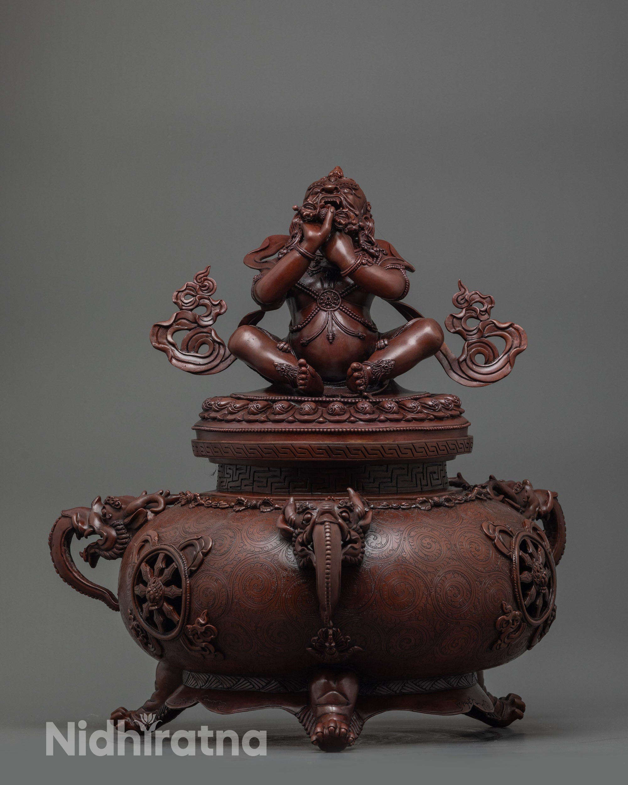 Front view of Oxidized Vajradhaka Statue holding vajra, crafted from oxidized copper