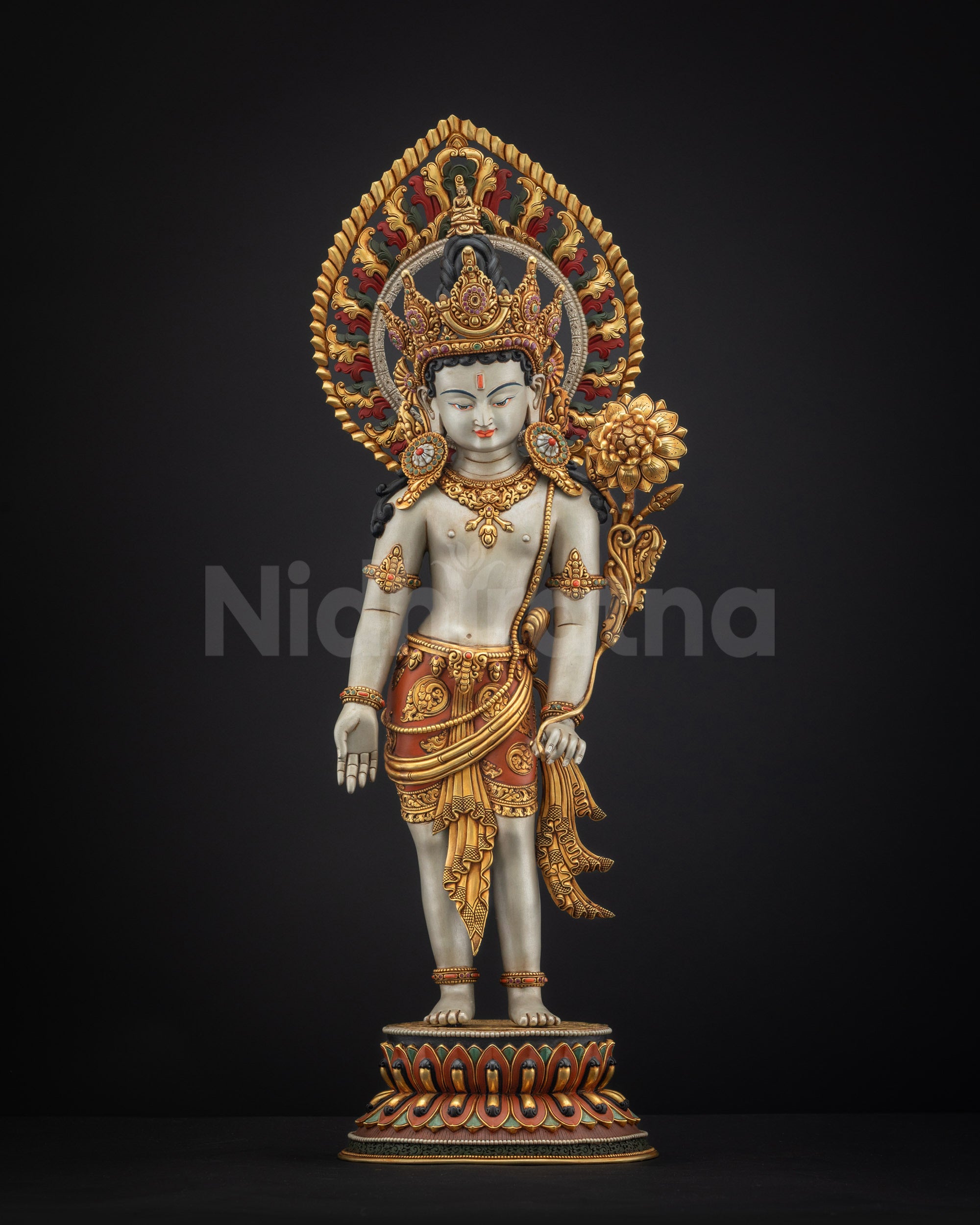 Front view of Padmapani Lokeshvara statue holding utpala stem on multi-colored lotus