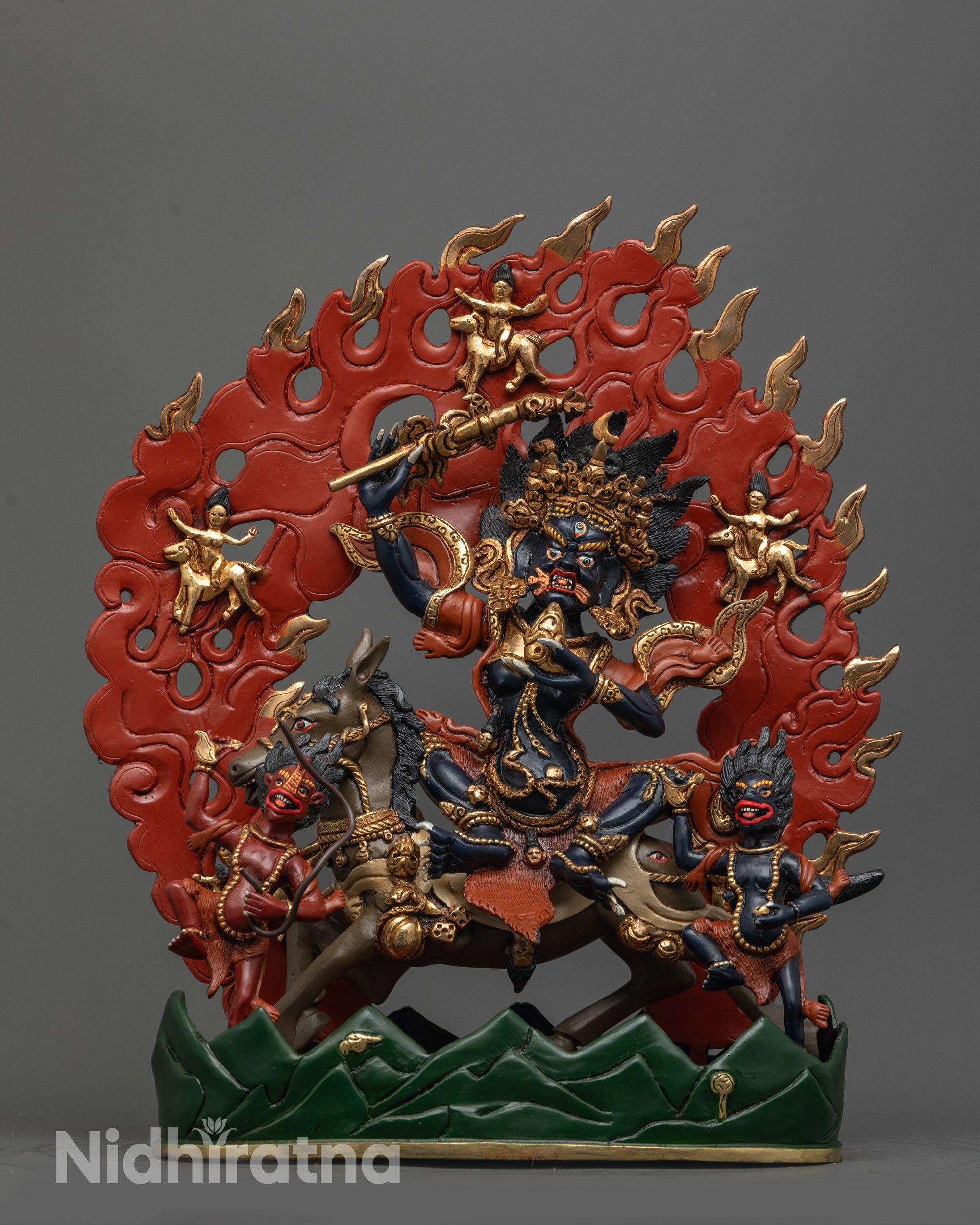 Front view of Palden Lhamo statue with wrathful expression and gold-plated details