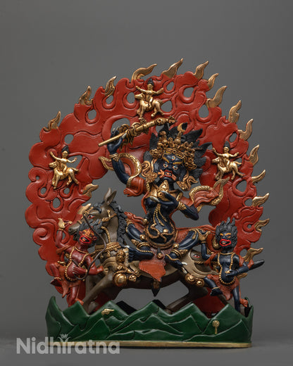 Front view of Palden Lhamo statue with wrathful expression and gold-plated details