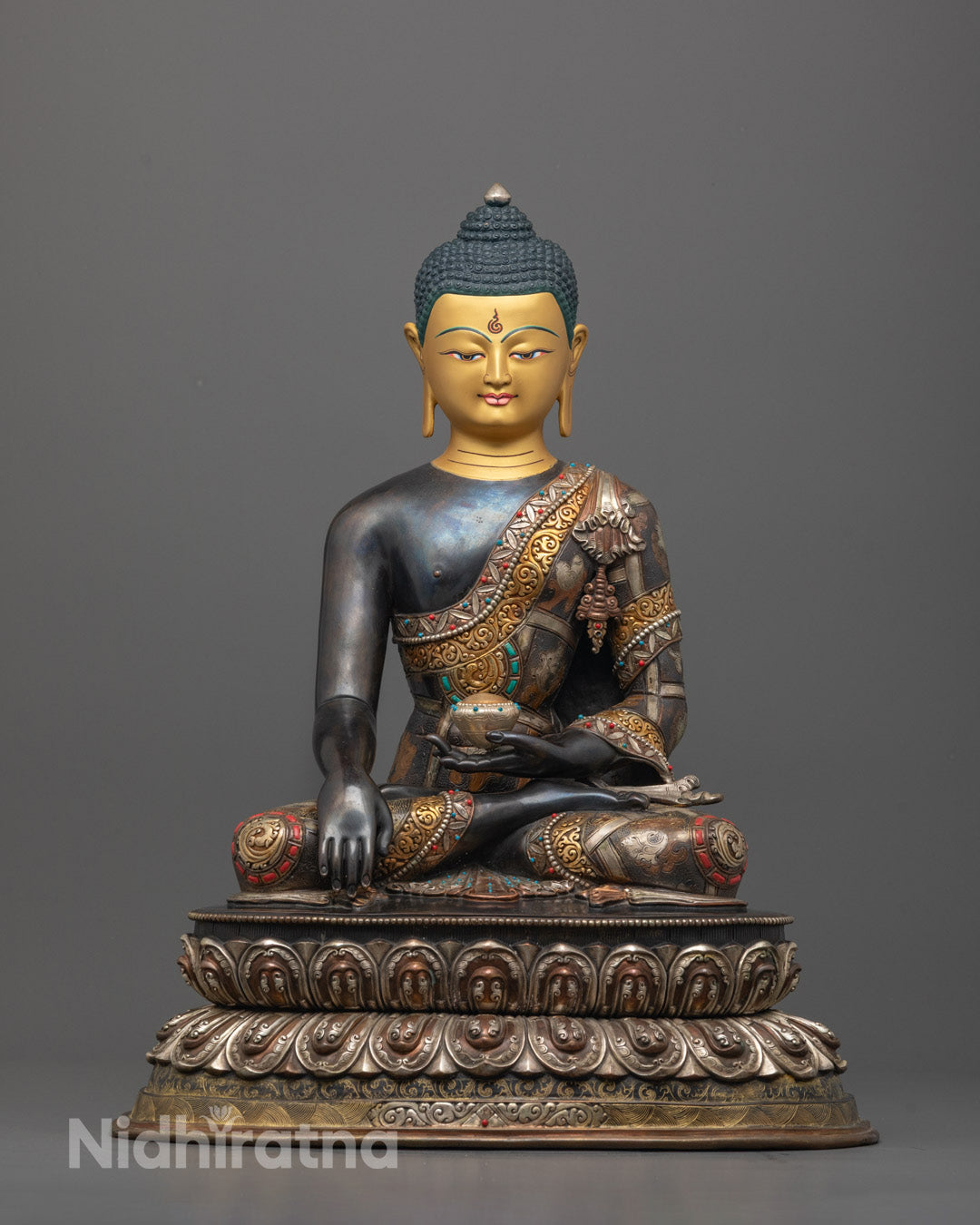 Front view of Premium Shakyamuni Buddha Statue with 24K gold-gilded face in Bhumisparsha Mudra