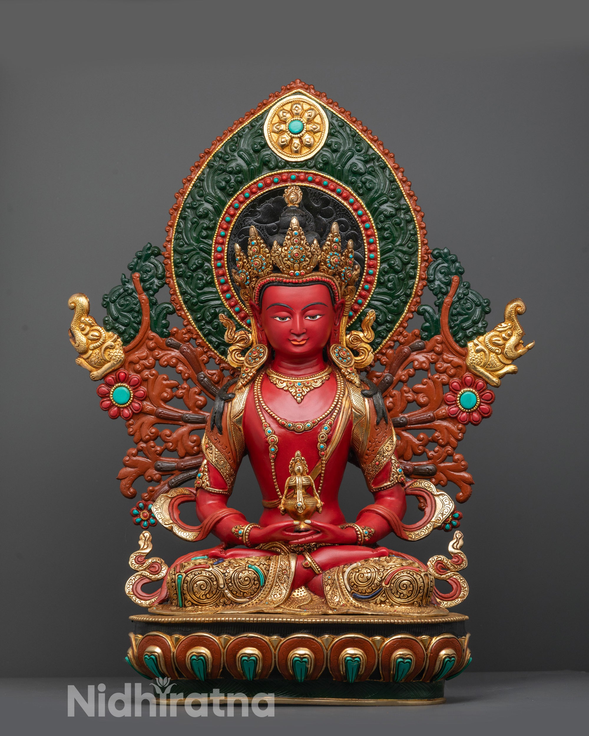 Front view of Red Hued Amitayus Statue showing red body, crown, and lotus base details